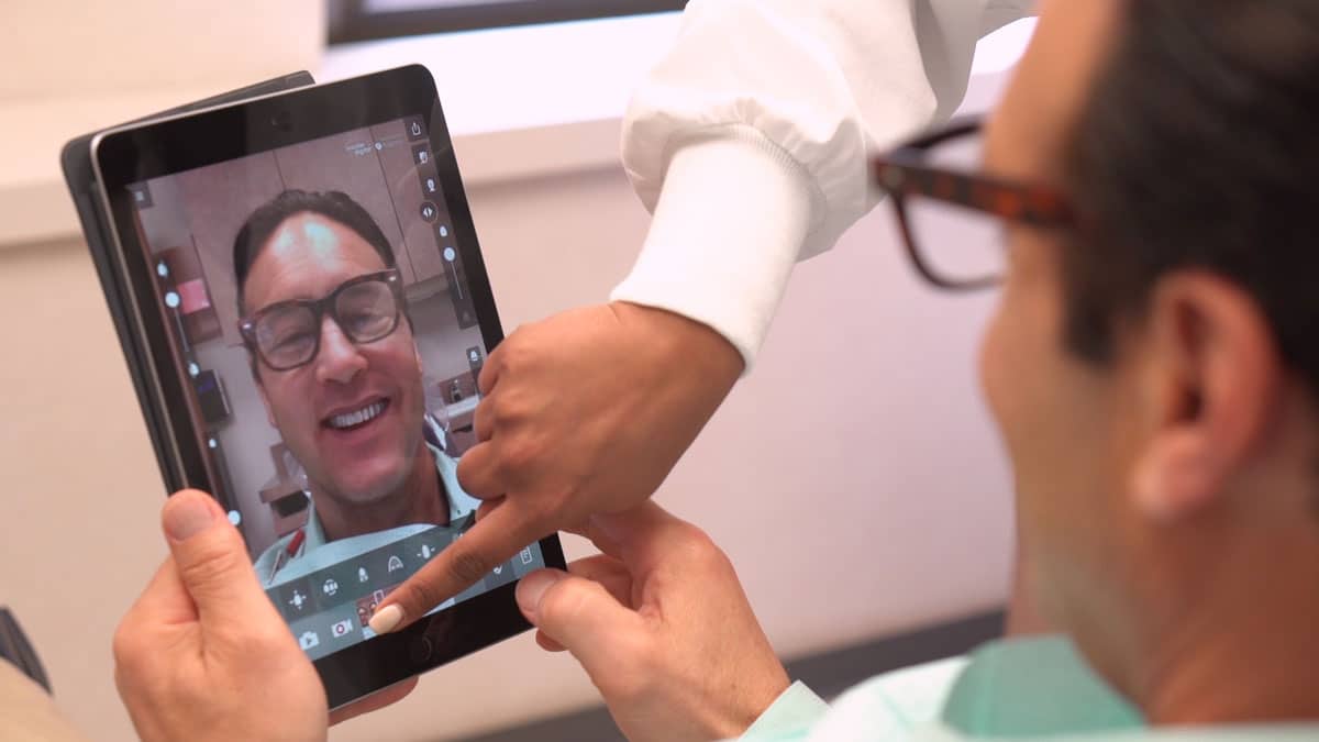 Man Smiling and Happy With His Aesthetic Dentistry Work